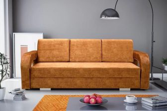 Musztardowa kanapa z bardzo dużą powierzchnią spania