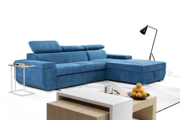 Niebieska kanapa narożna z funkcją spania z zagłówkami