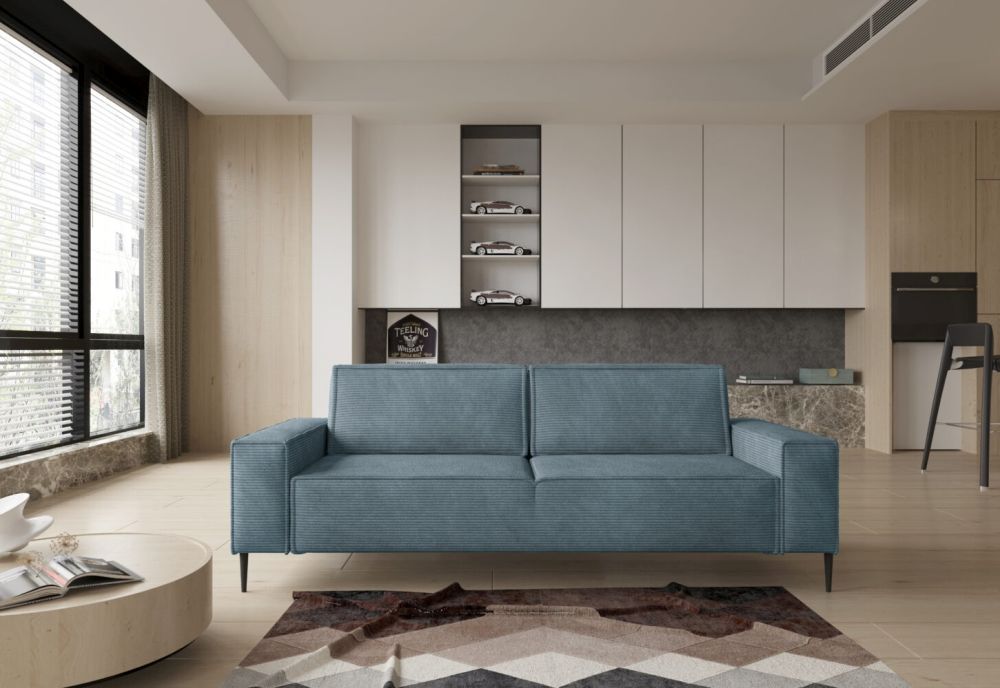 Prosta sofa rozkładana MURO w niebieskim sztruksie idealna do stylu marinistycznego!