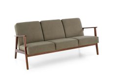 Oliwkowa sofa w stylu vintage