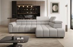 Lekka wizualnie sofa narożna z elektrycznie sterowanym siedziskiem