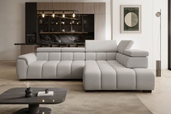 Lekka wizualnie sofa narożna z elektrycznie sterowanym siedziskiem